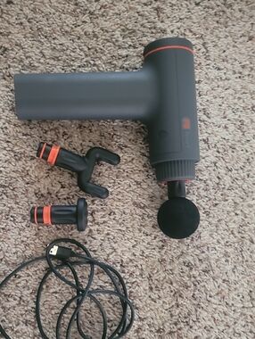 Sharper Image Gray and Orange Percussion Massage Gun with Interchangeable Heads